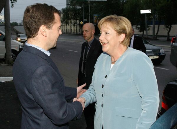 Dmitry Medvedev and Angela Merkel in the city of Yekaterinburg  - Sputnik International