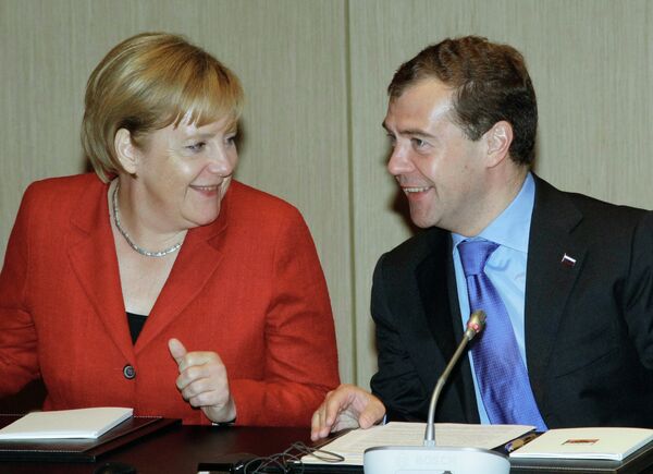 Dmitry Medvedev and Angela Merkel in Yekaterinburg  - Sputnik International
