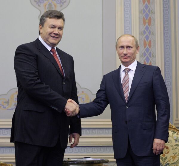 Russian Prime Minister Vladimir Putin arrived in Ukraine with President Viktor Yanukovych  - Sputnik International