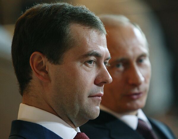 Russian President Dmitry Medvedev and Prime Minister Vladimir Putin - Sputnik International