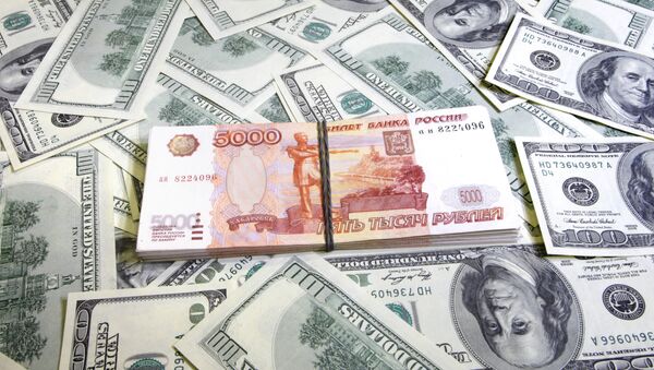 Russian ruble was trading at record 40 rubles against the US dollar Monday, according to Moscow Exchange data. - Sputnik International