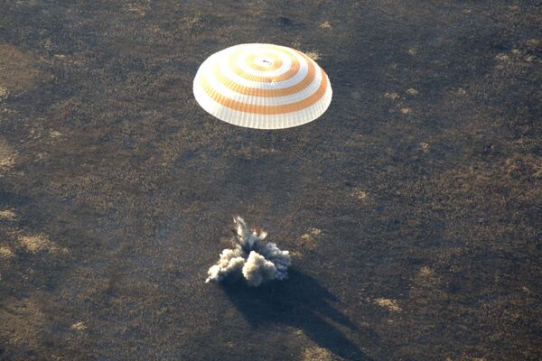Russian Soyuz TMA-18 spacecraft with 3 astronauts lands in Kazakhstan  - Sputnik International
