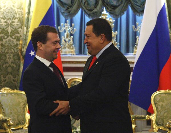 Venezuela's President Hugo Chavez with his counterpart Dmitry Medvedev - Sputnik International