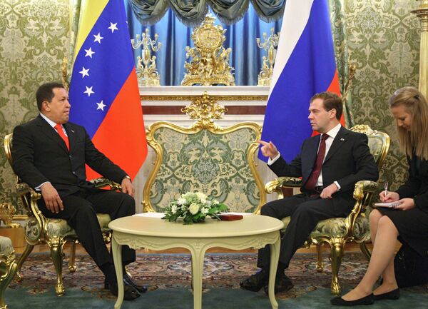 Venezuelan President Hugo Chavez with his counterpart Dmitry Medvedev  - Sputnik International