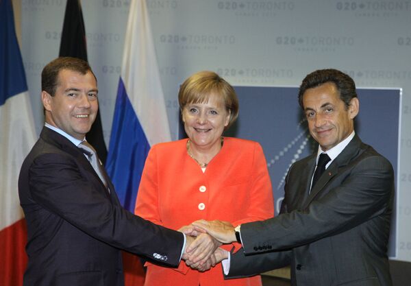 Dmitry Medvedev, Angela Merkel and  Nicolas Sarkozy  - Sputnik International
