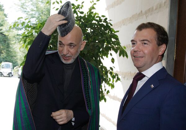 Russian President Dmitry Medvedev and Afghan President Hamid Karzai - Sputnik International
