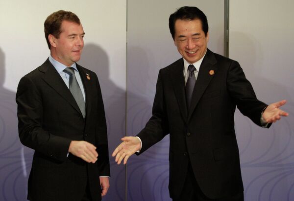 Russian President Dmitry Medvedev and Japanese Prime Minister Naoto Kan - Sputnik International