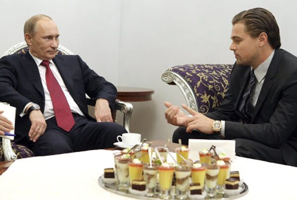 Vladimir Putin and Leonardo DiCaprio meet in St. Petersburg  - Sputnik International