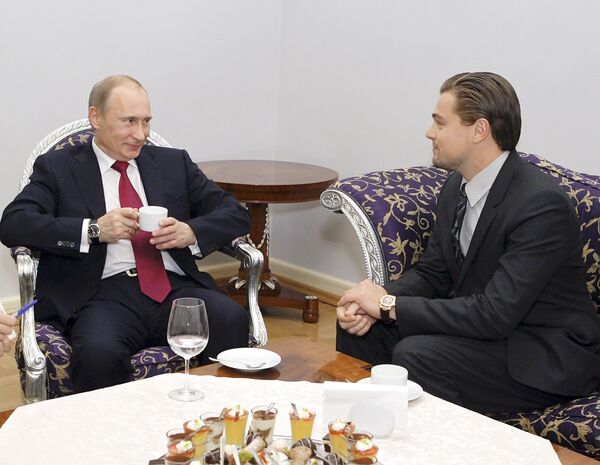 Vladimir Putin and Leonardo DiCaprio meet in St. Petersburg  - Sputnik International