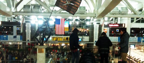 Пассажиры в аэропорту имени Джона Кеннеди в Нью-Йорке - Sputnik International