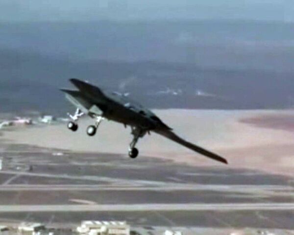 X-47B unmanned combat aerial vehicle makes maiden flight in California - Sputnik International
