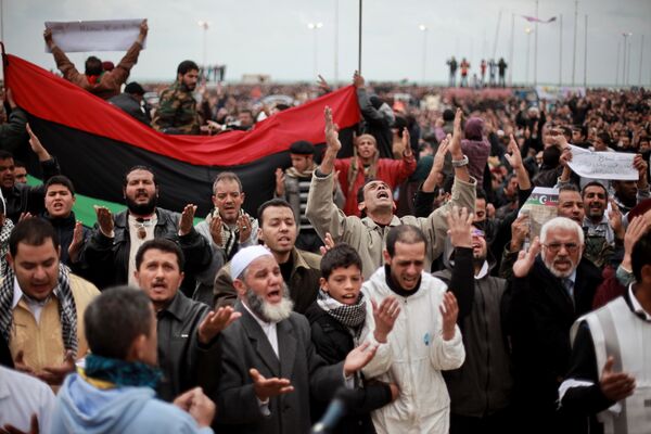 Violent nationwide protests demanding the end of Gaddafi's 42-year rule are currently raging across Libya.  - Sputnik International