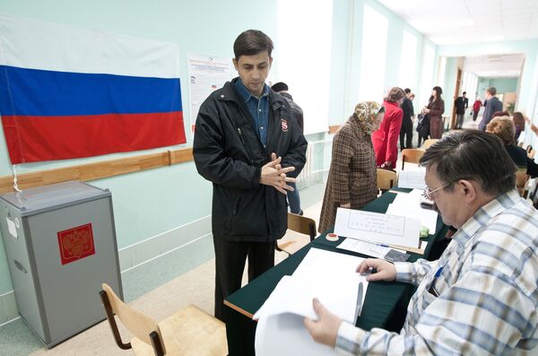 Millions of Russians vote in regional elections - Sputnik International