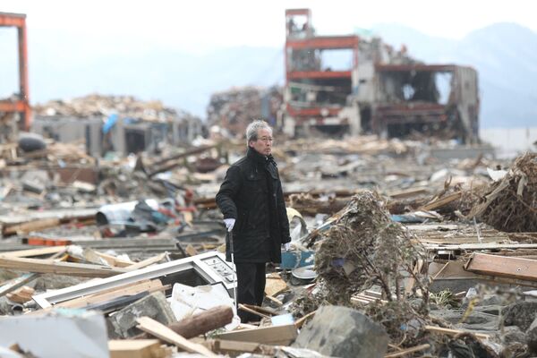 Confirmed dead in Japanese quake, tsunami passes 9,000 - Sputnik International