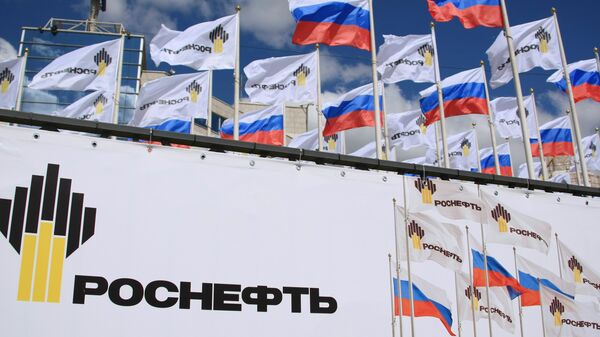 Логотип ОАО НК Роснефть - Sputnik International