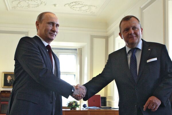 Russian Prime Minister Vladimir Putin and his Danish counterpart Lars Lokke Rasmussen - Sputnik International