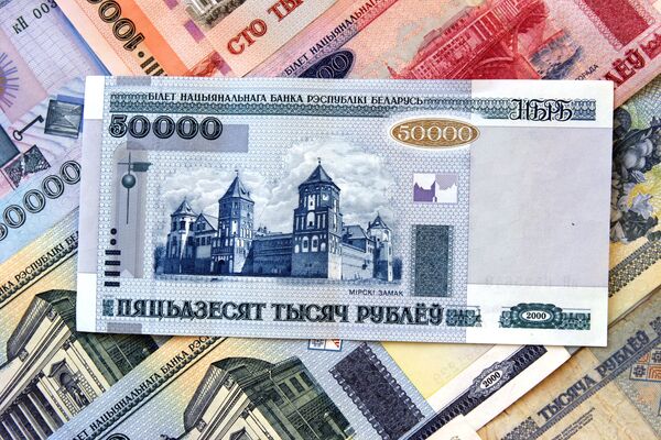 The National Bank of Belarus devalued the national currency on Monday by 56 percent against the U.S. dollar. - Sputnik International