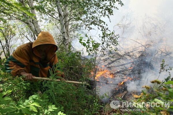 Putting out forest fires in the Krasnoyarsk Territory  - Sputnik International