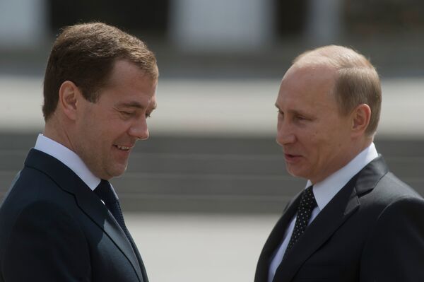 Russian President Dmitry Medvedev and Prime Minister Vladimir - Sputnik International