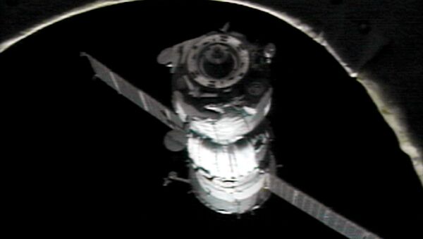 A Russian Soyuz spacecraft flies undocked from the International Space Station. Files - Sputnik International