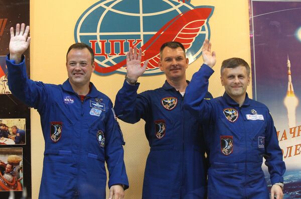 Borisenko, Samokutyayev and Garan  - Sputnik International