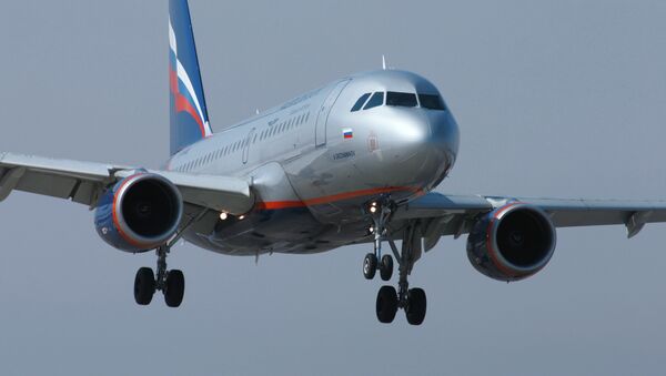 Aeroflot's CEO Vitaly Savelyev said the company plans to increase passenger traffic on flights to Crimea. - Sputnik International