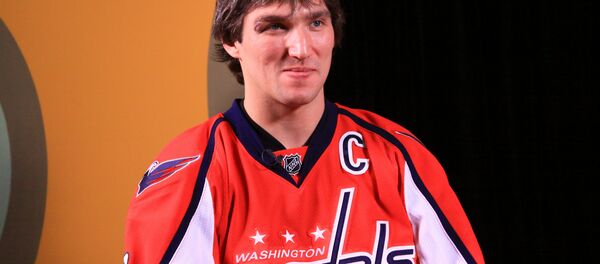 Washington Capitals' winger Alex Ovechkin, known to NHL fans as Ovi, became the hockey club's all-time franchise points leader on Tuesday. - Sputnik International