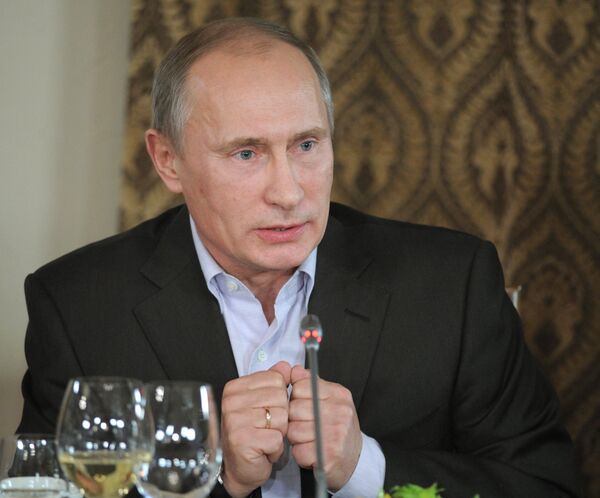Russian Prime Minister Vladimir Putin at a meeting with members of the Valdai discussion club - Sputnik International