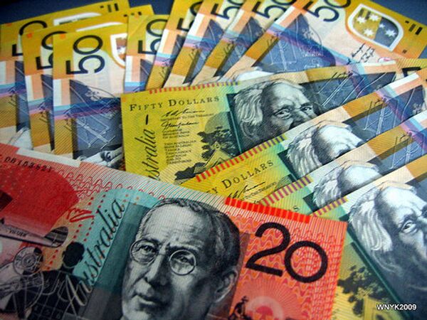 Russia plans to start investing some of its foreign currency reserves into the Australian dollar from February to diversify its international holdings amid global market volatility - Sputnik International