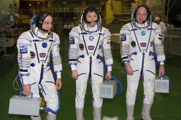 NASA astronaut Don Pettit, Russian cosmonaut Oleg Kononenko, and European Space Agency astronaut Andre Kuipers - Sputnik International