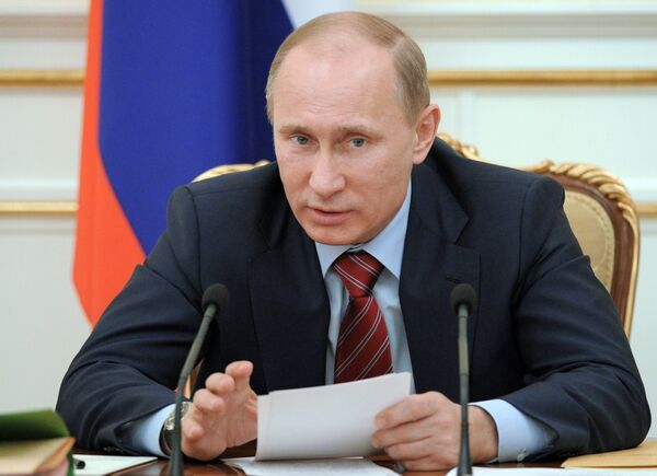 Russian Prime Minister and presidential candidate Vladimir Putin - Sputnik International