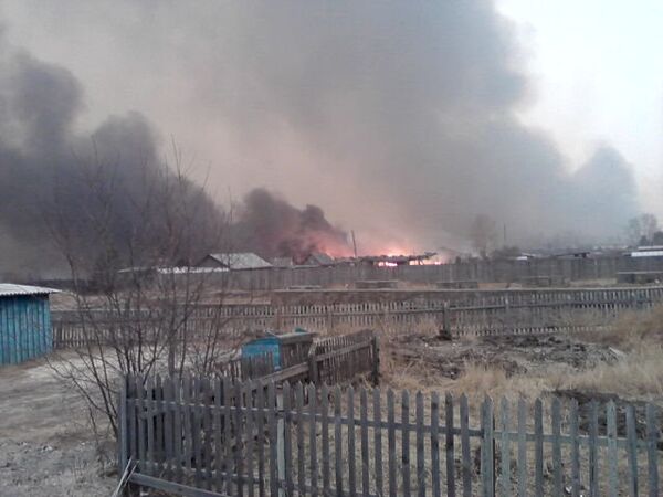 Wildfire in the village of Tygda, Amur region - Sputnik International