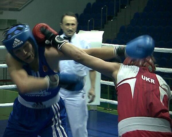 Russia’s female Olympic boxing hopefuls have started strongly at the world championships in China with Viktoria Gurkovich and Irina Poteeva winning their first bouts - Sputnik International