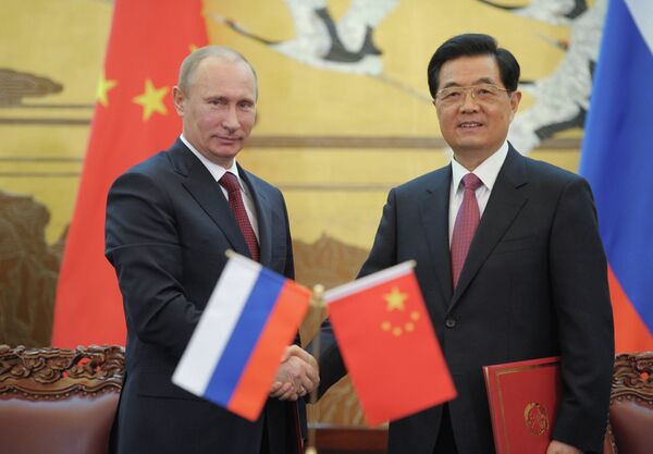 Vladimir Putin and Hu Jintao - Sputnik International