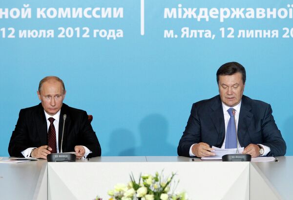 Russian President Vladimir Putin and his Ukrainian counterpart Viktor Yanukovych - Sputnik International