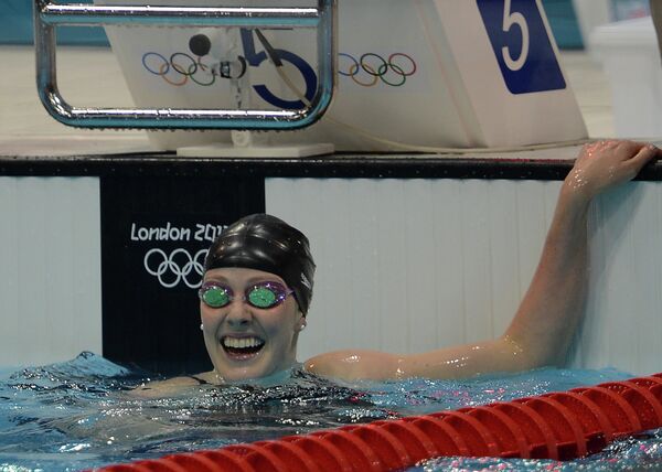 American swimmer Missy Franklin won gold in a tight Olympic 100 meters backstroke final on Monday. - Sputnik International