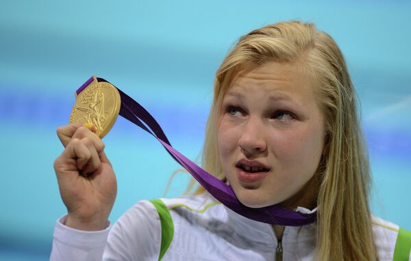 Fifteen-year-old Lithuanian Ruta Meilutyte took a surprise Olympic gold medal in the 100 meters breaststroke on Monday. - Sputnik International