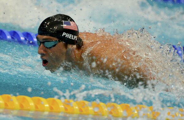 American swimmer Michael Phelps became history's most medaled Olympian on Tuesday - Sputnik International