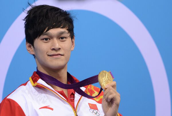Chinese world champion Sun Yang steamed to gold in the 1,500 meters freestyle on Saturday, lopping a massive three seconds off his own world record - Sputnik International