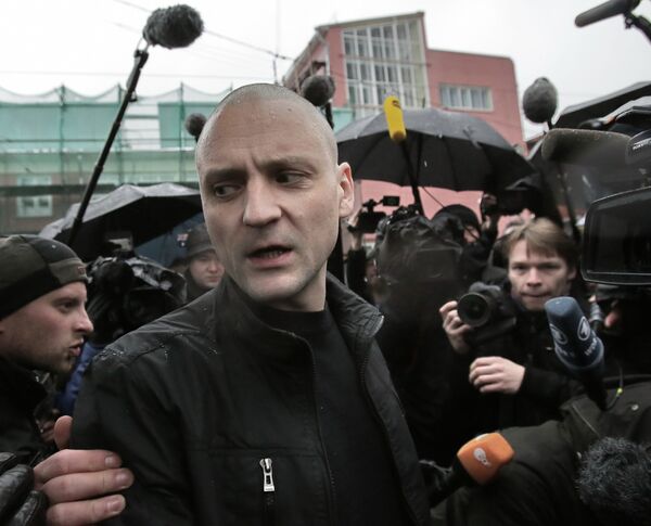 Russian protest leader Sergei Udaltsov was charged with plotting mass disorder on Friday and could face up to 10 years behind bars if found guilty. - Sputnik International