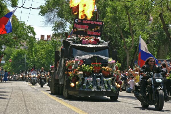 Mad Max on parade, seen here being led by Night Wolves club leader Alexander Zaldostanov. Mad Max on parade, seen here being led by Night Wolves club leader Alexander Zaldostanov. - Sputnik International