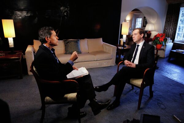 Russian Prime Minister Dmitry Medvedev gives an interview to CNN in Davos on January 23, 2013 - Sputnik International