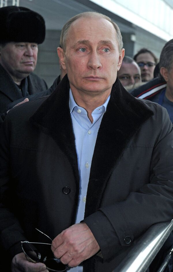 Russian President Vladimir Putin on a visit to the Olympic Park - Sputnik International