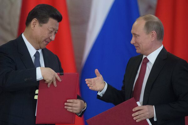 Xi Jinping and Vladimir Putin (archive) - Sputnik International