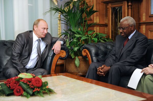 Russian President Vladimir Putin and IAAF president Lamine Diack - Sputnik International