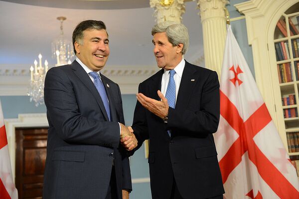 Georgian President Mikheil Saakashvili, left, with US Secretary of State John Kerry in Washington on Wednesday. - Sputnik International