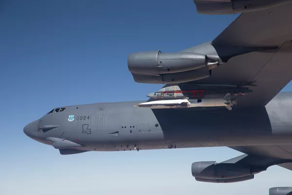 The US experimental X-51A Waverider aircraft tucked under the wing of a B52 bomber. The US experimental X-51A Waverider aircraft tucked under the wing of a B52 bomber. - Sputnik International