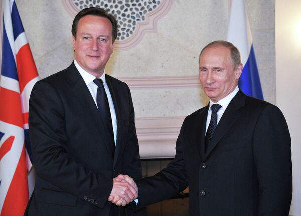 Russian President Vladimir Putin and UK Prime Minister David Cameron (archive) - Sputnik International