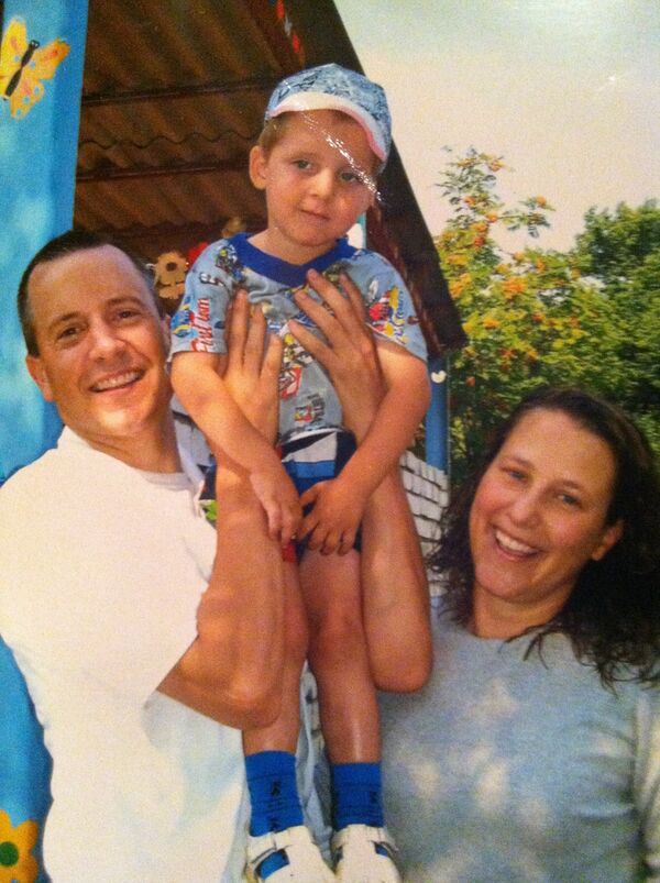 John and Rachel Thomas met their son Jack in June 2008, and adopted him in December of that year.  - Sputnik International