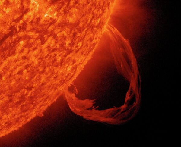 A cropped image showing a prominence, or bright gaseous protrusion extending outward from the sun’s surface. - Sputnik International